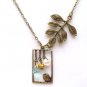 Antiqued Brass Leaf Bird Quartz Pearl Necklace