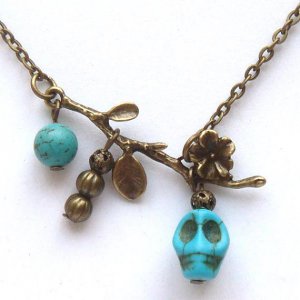 Antiqued Brass Branch Turquoise Skull Necklace