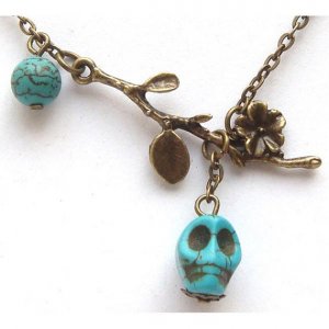 Antiqued Brass Branch Turquoise Skull Necklace