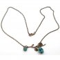 Antiqued Brass Branch Turquoise Skull Necklace