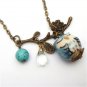 Antiqued Brass Leaf Turquoise Quartz Porcelain Owl Necklace
