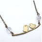 Antiqued Brass Bird Quartz Necklace