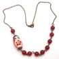Antiqued Brass Jade Porcelain Matryoshka Necklace
