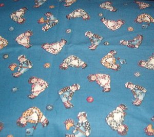 Raggedy Dolls and Buttons on Blue Fabric 36"w x 3/4 yd