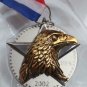 2002 Hallmark Keepsake Ornament Medal For America Eagle on Star in Orig Box Card