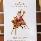 Hallmark 2010 Ornament High Flying Fun Santa Claus with Star on Reindeer Metal