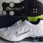 NEW IN BOX MENS NIKE SHOX R4 SIZE 10 COLOR WHITE AND BLACK