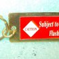 St. Evans "Caution: Flashbacks" Metal Key Chain 1 1/4" X 3"  UPC:710534489768