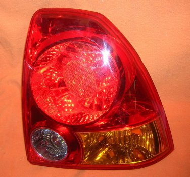 TYC Right Tail/ Stop/ Turn/ Back Up Light Assembly #11-6013B  UPC:710534484626