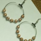 Silver tone with stardust copper ball