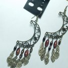 Copper tone moon style earring with brown dangle bead