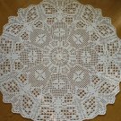 White crocheted doily with Butterflies