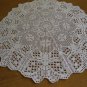 White crocheted doily with Butterflies