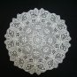 White crocheted doily with Butterflies