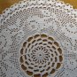 Round white doily garland of roses