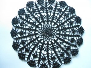 Black crochet doily