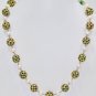 Emerald Studded 22 Kt Lac Balls With Sea Water Pearls