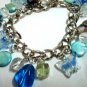 Glass butterfly mop shell coin bracelet 6.5" -8.5"