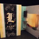 L.A.M.B. GWEN STEFANI WOMAN EDP mini parfum vial spray 1.2ml 0.04 fl.oz.