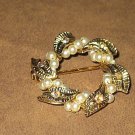 CIRCULAR BROOCH