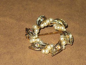 CIRCULAR BROOCH