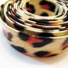 1 Meter ( 1 Yard ) of 13mm Leopard Line ( Cream Black Orange ) Flat Leather Like Cord
