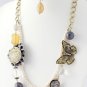 ASSORTED STONE BUTTERFLY NECKLACE.