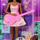 Barbie 65th Anniversary Doll & 10 Accessories, Pop Star Set with Brunette Singer Doll, Toy Stage