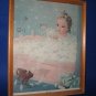 Little girl in bubble bath framed print vintage