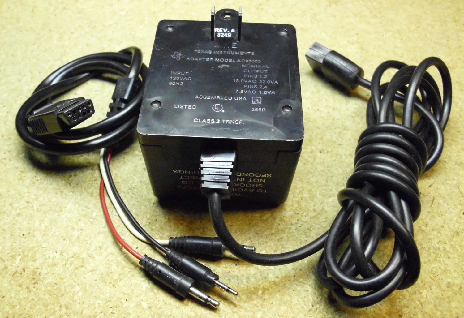 Ti99-4a power supply for Texas Instruments home computer and a cable.