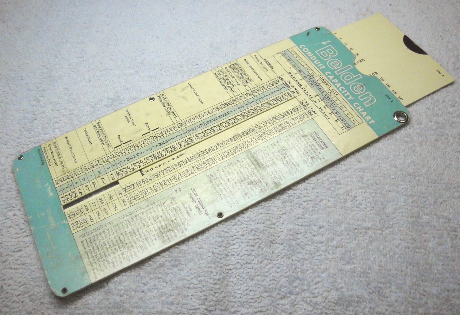 Belden wire, conduit capacity slide rule chart 1964, by Perrygraf.