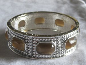 Silver with brown stones