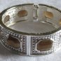 Silver with brown stones
