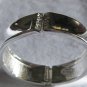 silver cuff with rhinestones