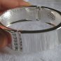 silver cuff with rhinestones