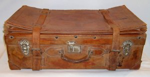 Antique leather suitcase Cuban expanding with straps, false bottom and key