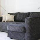 IKEA Manstad Corner Sofa-bed with storage Custom slipcover in Nomad Black.