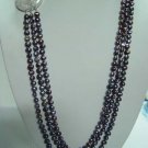 21""-23"" 7-8mm black pearl necklace w/ cameo lady clasp