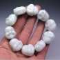 Hand carved jade Buddha, bracelet. A successful man like best
