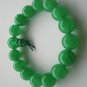 Buddhist prayer beads. Bracelet. 12 mm beads, 16 green jade beads. Christmas gifts.