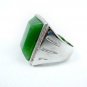 Jade square surface. Antique Tibetan silver inlay green jade ring. Selection of a successful man