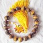 Natural Yellow Tiger Eye. 10mm beads. 19 hand-carved tiger eye stone bracelet