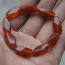 Hand-carved,; multi-faceted red agate bracelet, nine beads. Natural quality agate bracelet. Hand-carved,; multi-faceted red agate bracelet, nine beads. Natural quality agate bracelet.