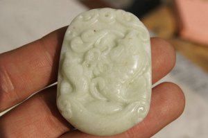 Natural white jade. Hand-carved; jade carp. Auspicious pendant