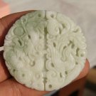 Natural jade pendant. Hand-carved dragon and phoenix. Auspicious white jade pendant Natural jade pendant. Hand-carved dragon and phoenix. Auspicious white jade pendant