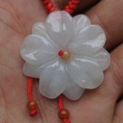 Natural jade pendant. White carved jade pendant. Lucky charms. Natural jade pendant. White carved jade pendant. Lucky charms.