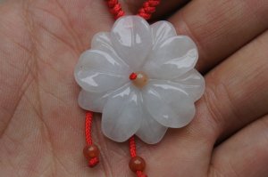 Natural jade pendant. White carved jade pendant. Lucky charms.