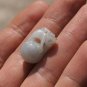 Natural white jade. Hand-carved; brave stand in the ball, which means that (response)