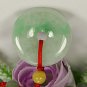 Floating emerald green peace buckle. Pendant. Good luck pendant.
