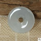 Jade white peace button. Pendant. Good luck pendant. Jade white peace button. Pendant. Good luck pendant.